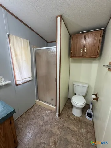 a bathroom with a toilet sink and tub