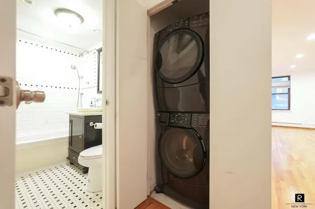a bathroom with a toilet and a sink