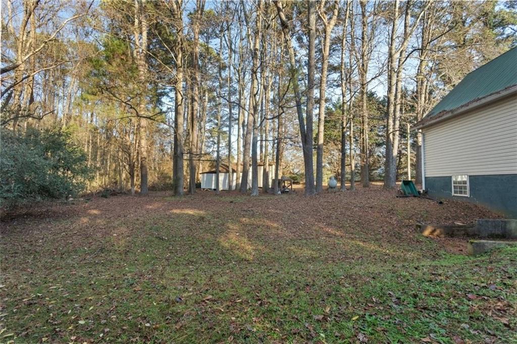 16049 Hopewell Road Alpharetta, GA 30004 - Photo 22 of 30 a view of outdoor space and yard