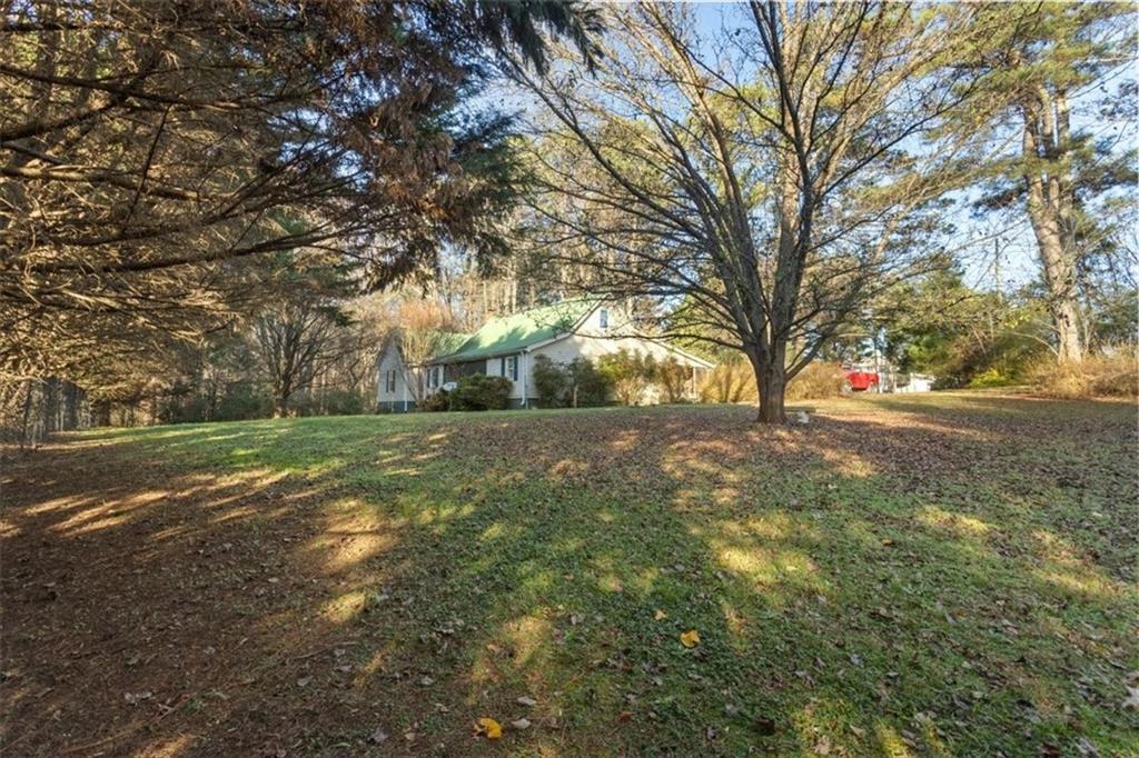 16049 Hopewell Road Alpharetta, GA 30004 - Photo 26 of 30 a view of yard with green space