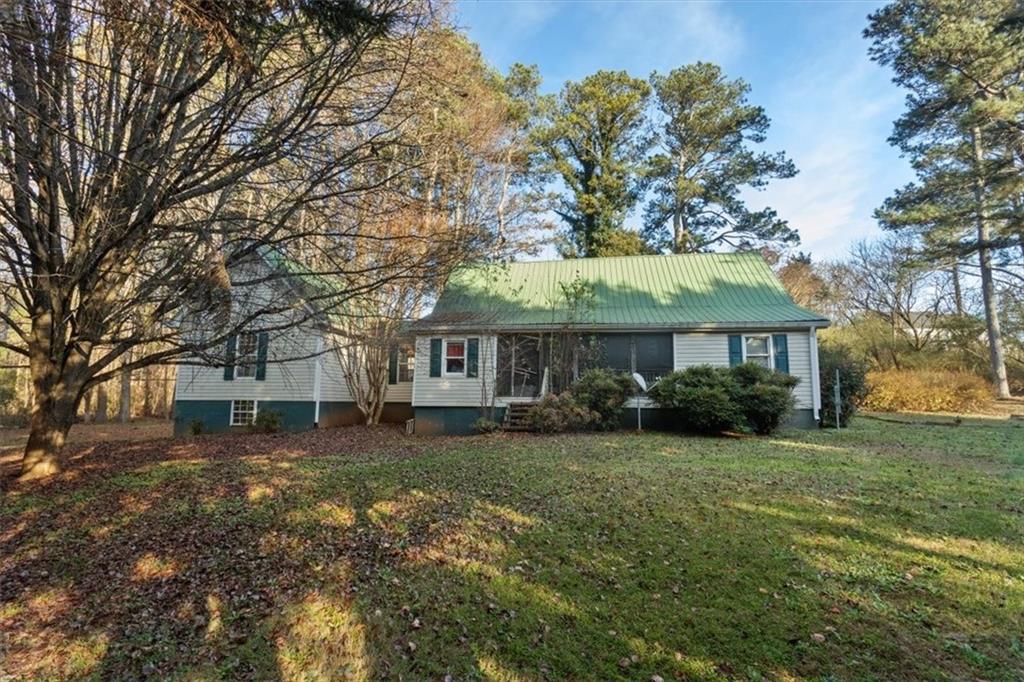 16049 Hopewell Road Alpharetta, GA 30004 - Photo 27 of 30 a view of a house with a yard