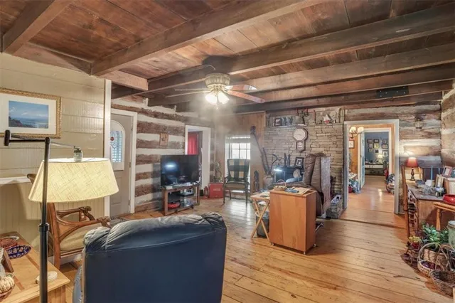 a bedroom with furniture and a bed