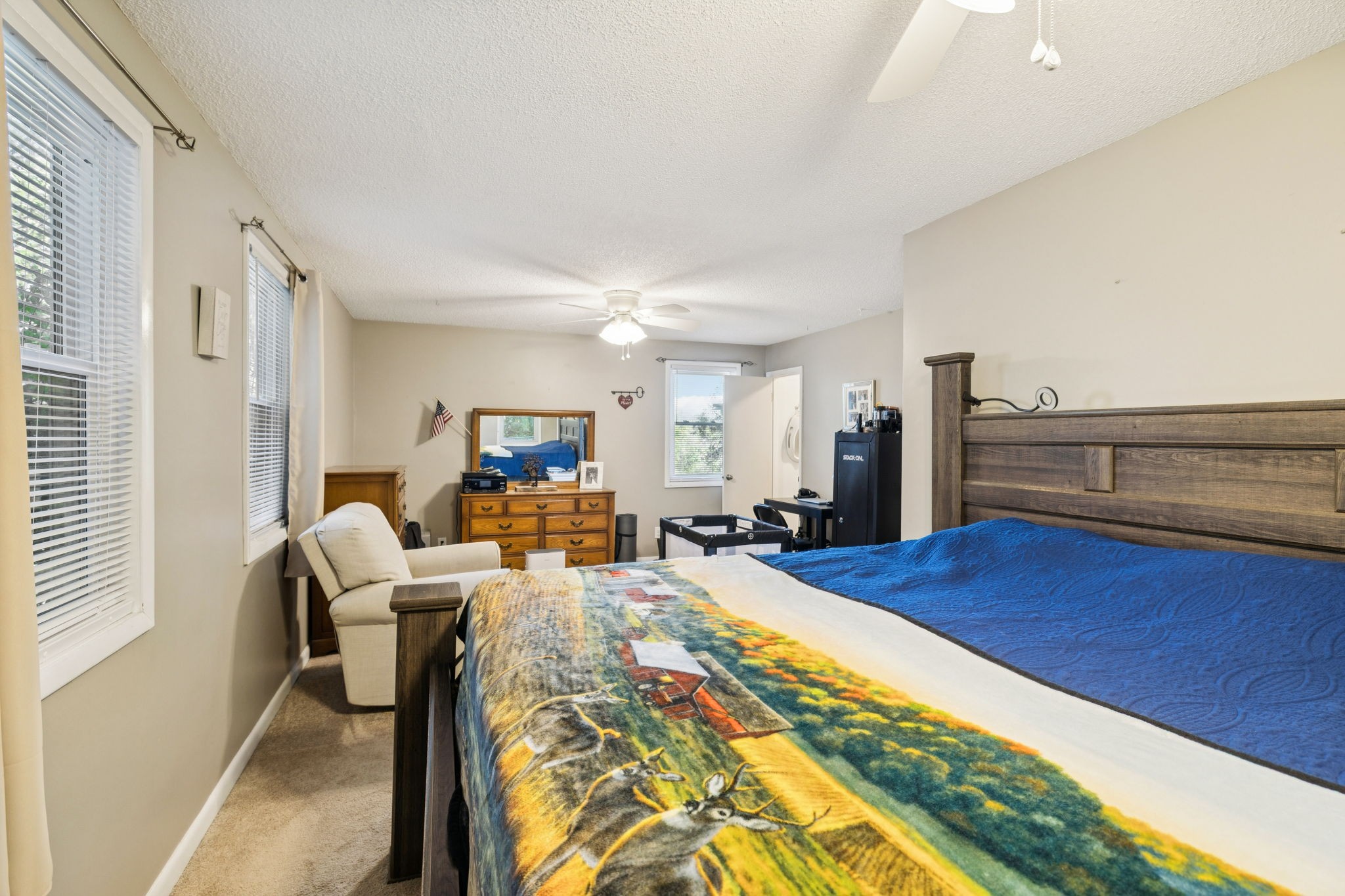 699 Rock Bridge Road Gallatin, TN 37066 - Photo 11 of 35 a bed room with a bed and a chair