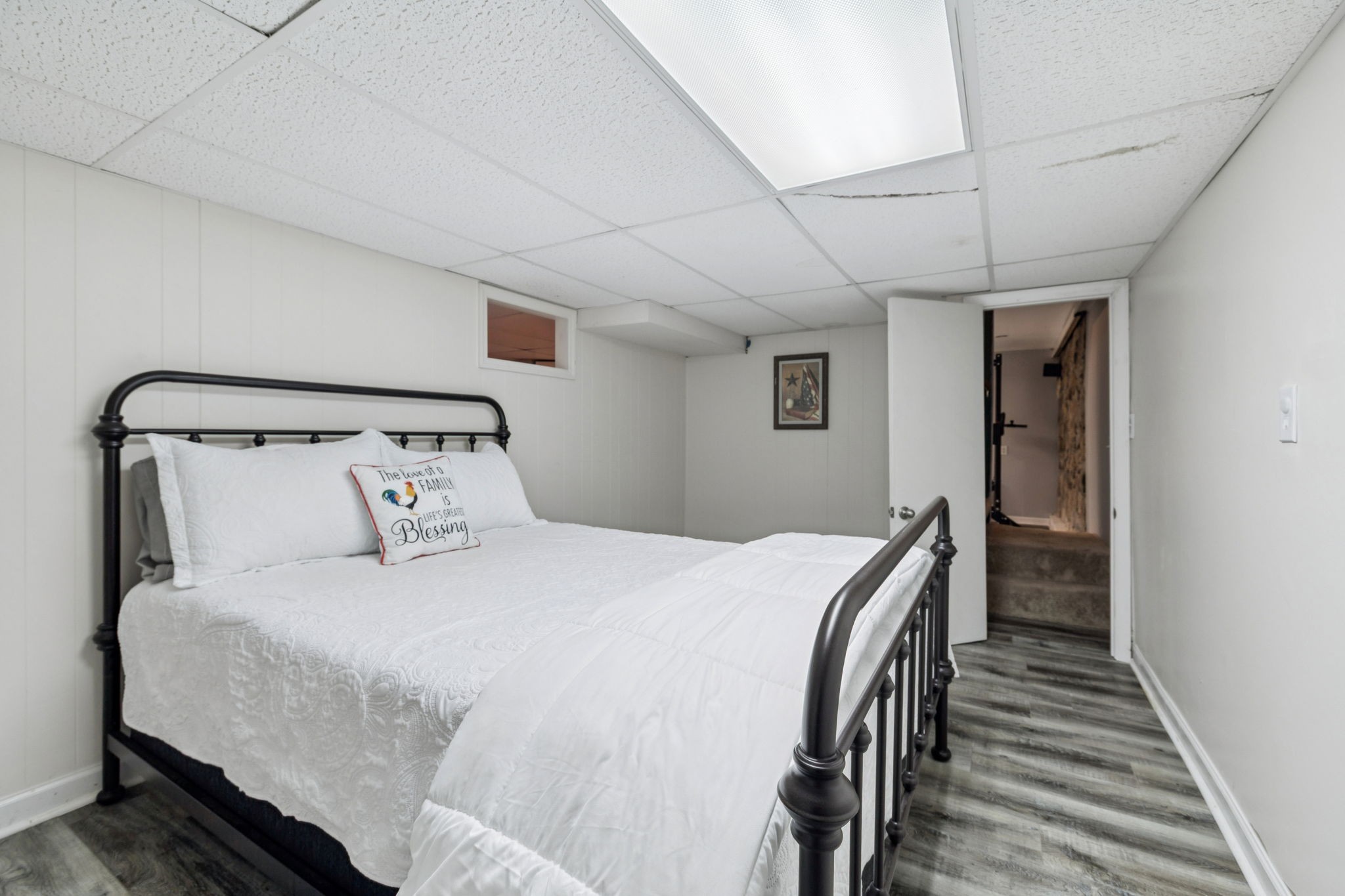 699 Rock Bridge Road Gallatin, TN 37066 - Photo 17 of 35 a bedroom with a bed and wooden floor
