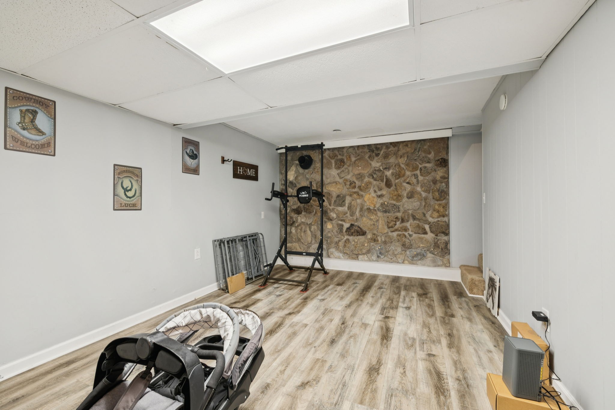 699 Rock Bridge Road Gallatin, TN 37066 - Photo 20 of 35 a view of a livingroom with furniture and gym equipment