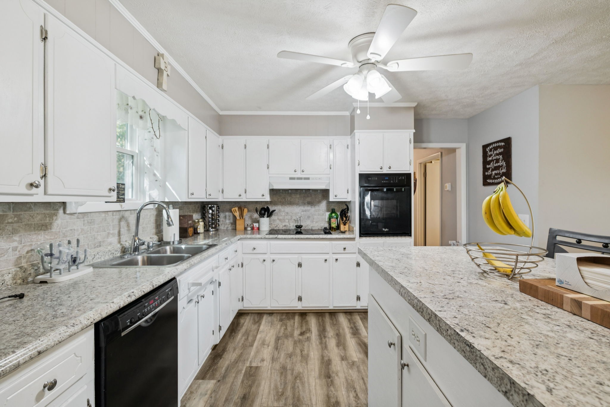 699 Rock Bridge Road Gallatin, TN 37066 - Photo 3 of 35 a kitchen with kitchen island granite countertop a sink appliances cabinets and furniture
