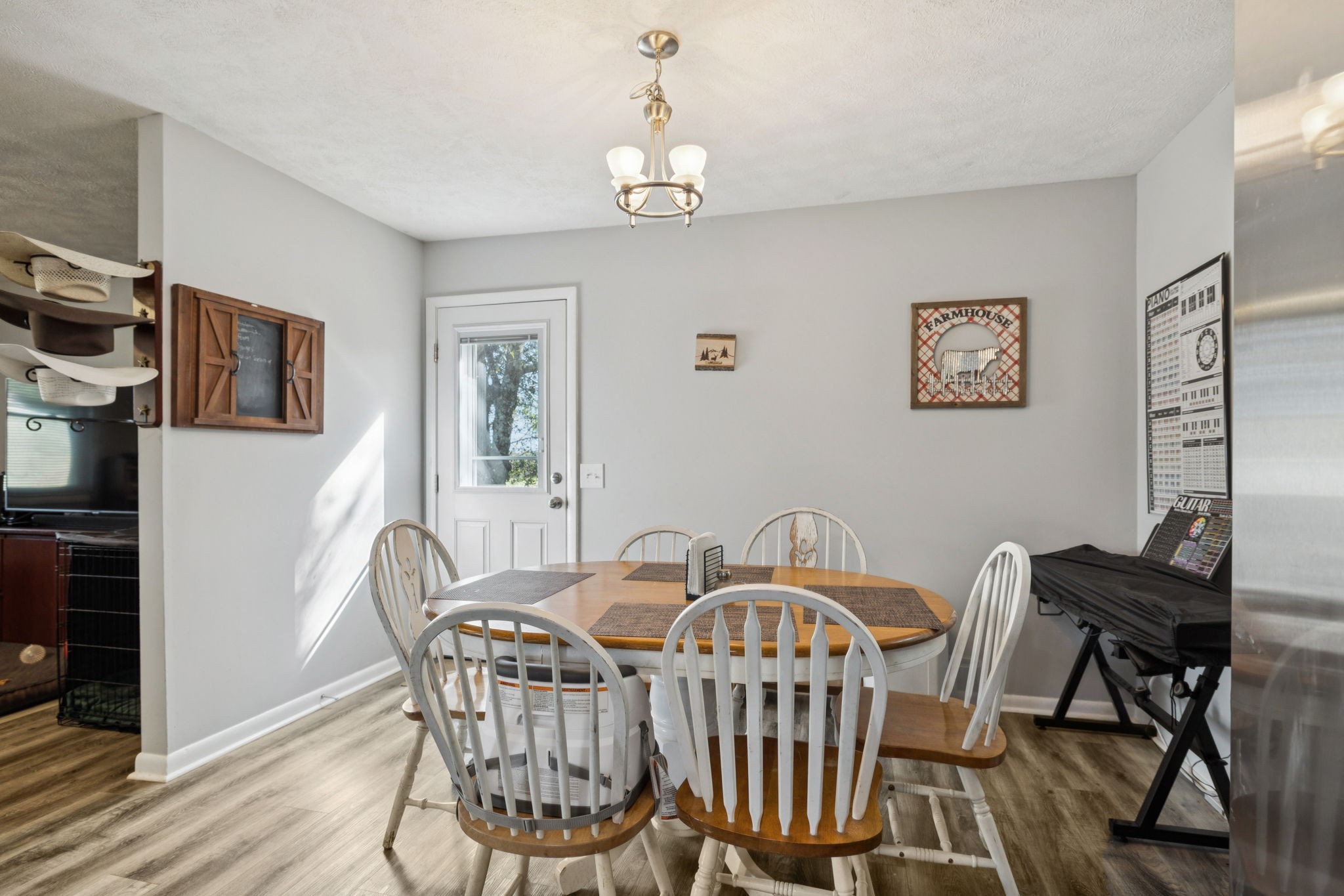 699 Rock Bridge Road Gallatin, TN 37066 - Photo 7 of 35 a view of a dining room with furniture window and wooden floor