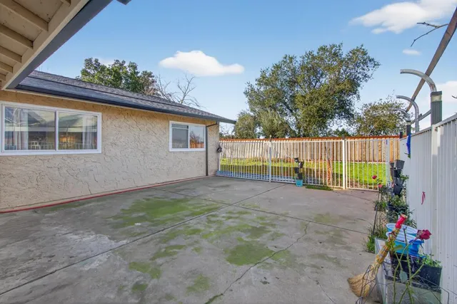 a view of a backyard with a garden