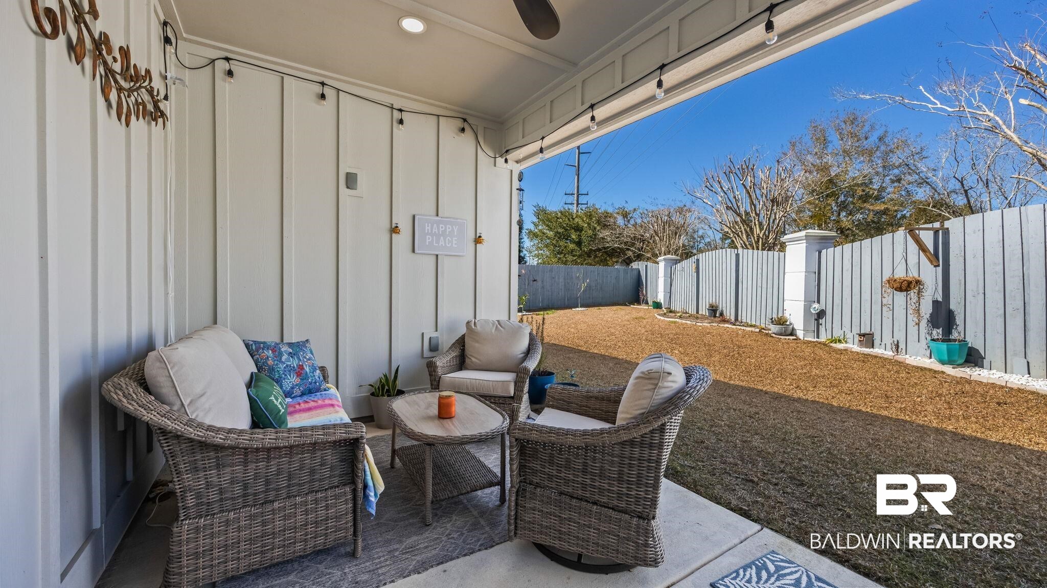 8013 Carmel Circle Foley, AL 36535 - Photo 29 of 49 Fenced backyard with a patio and outdoor lounge area