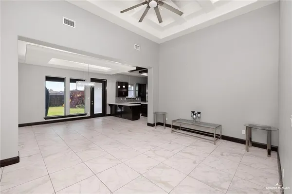 a view of kitchen with furniture and window