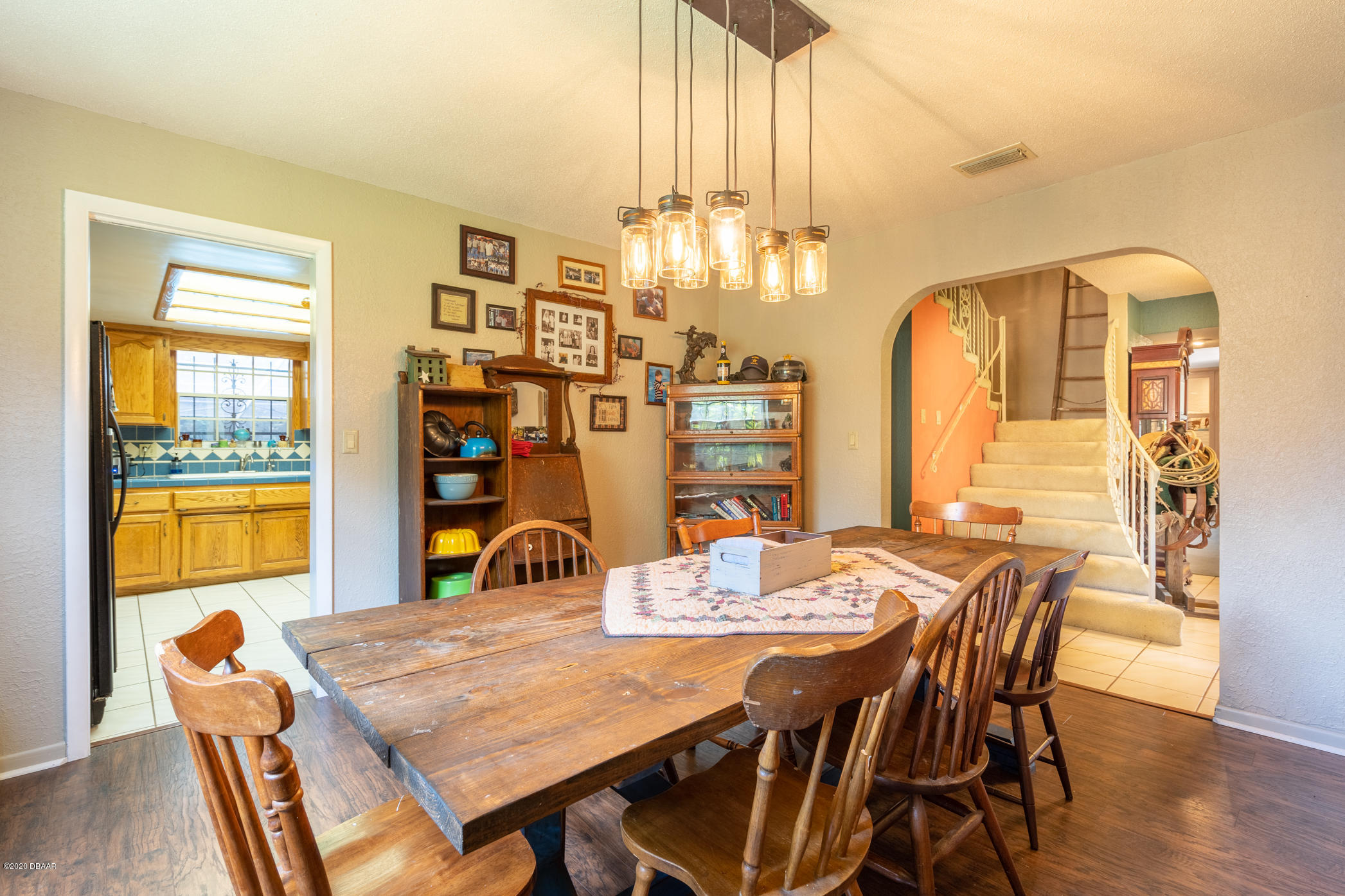 7 Twin River Drive Ormond Beach, FL 32174 - Photo 13 of 45 a view of a dining room with furniture window and wooden floor