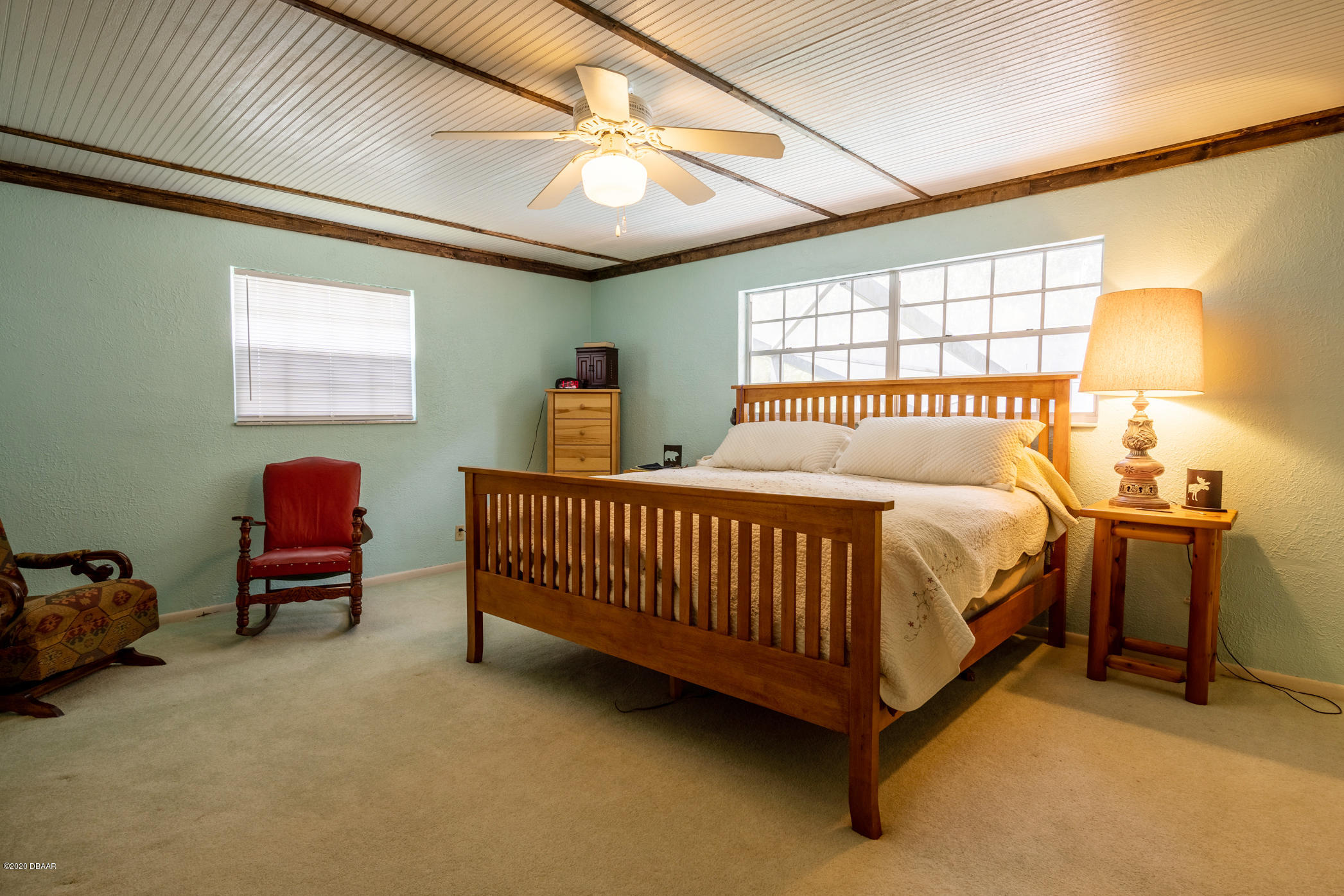 7 Twin River Drive Ormond Beach, FL 32174 - Photo 21 of 45 a bed sitting in a room next to a window