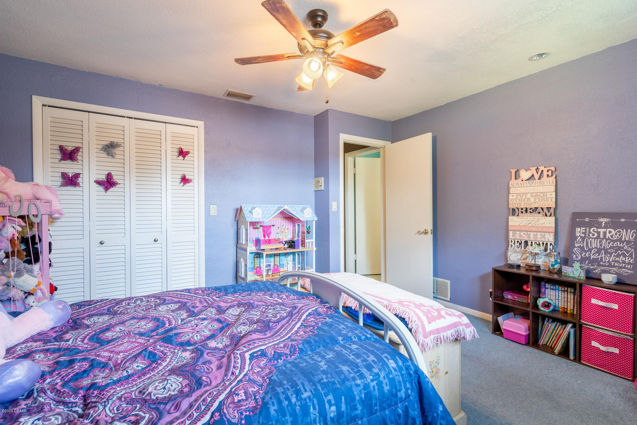7 Twin River Drive Ormond Beach, FL 32174 - Photo 28 of 45 a bed room with a bed and a dresser