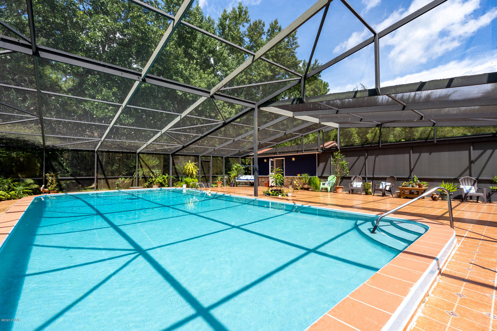 7 Twin River Drive Ormond Beach, FL 32174 - Photo 33 of 45 a view of a swimming pool with a patio