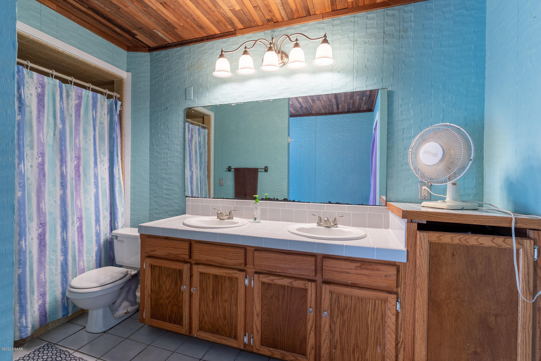 7 Twin River Drive Ormond Beach, FL 32174 - Photo 37 of 45 a bathroom with a sink and a mirror