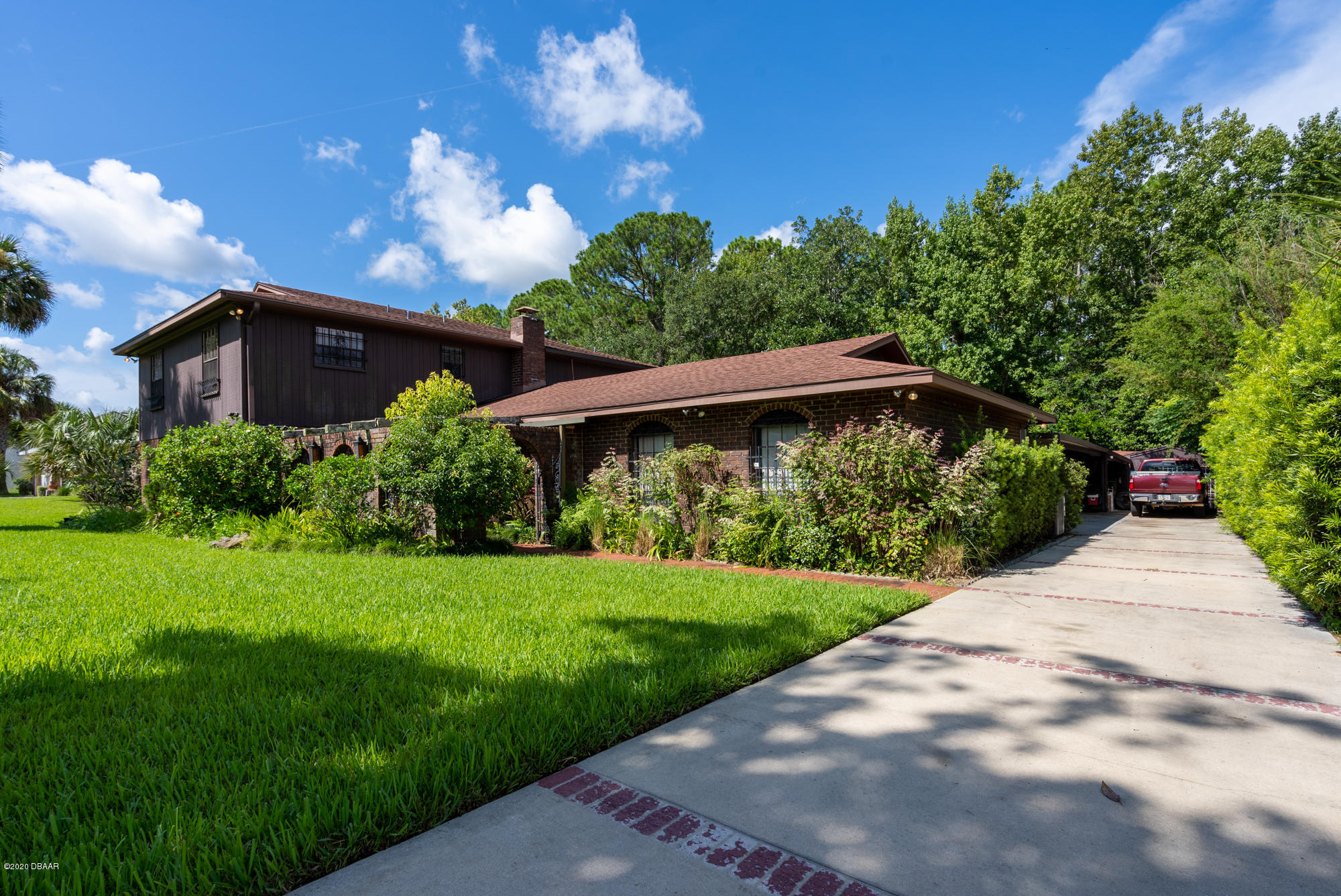 7 Twin River Drive Ormond Beach, FL 32174 - Photo 39 of 45 a view of a pathway with a yard