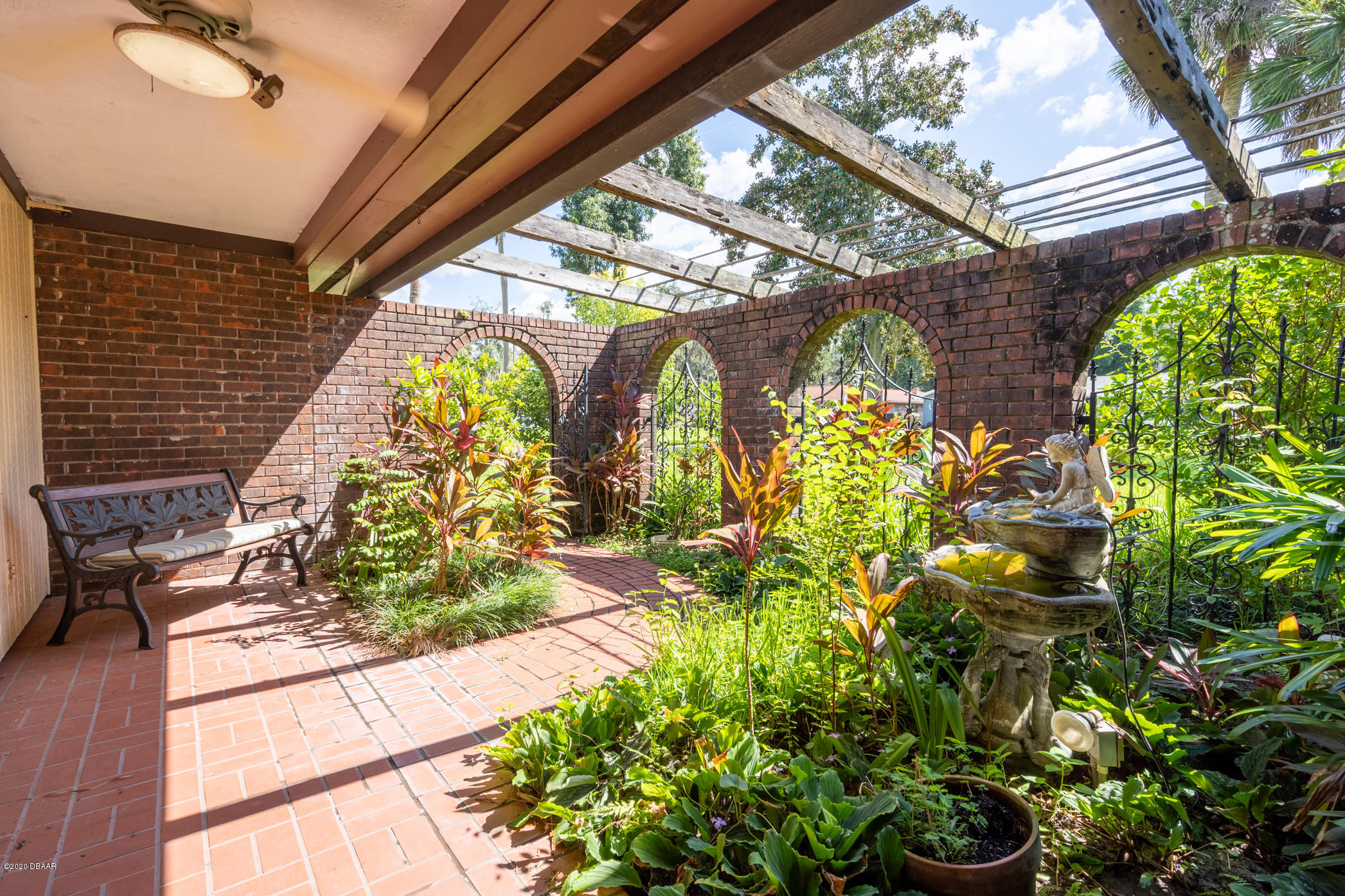 7 Twin River Drive Ormond Beach, FL 32174 - Photo 5 of 45 a view of balcony with two plants