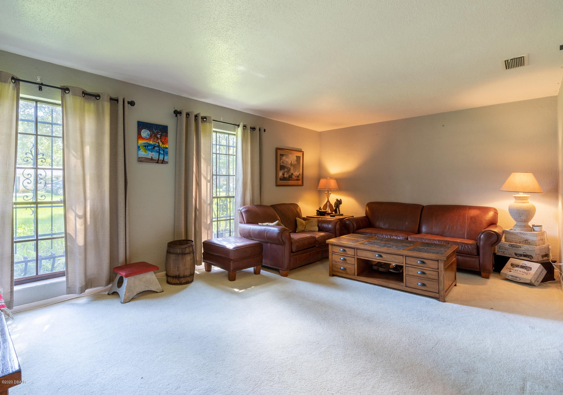 7 Twin River Drive Ormond Beach, FL 32174 - Photo 7 of 45 a living room with furniture and a window