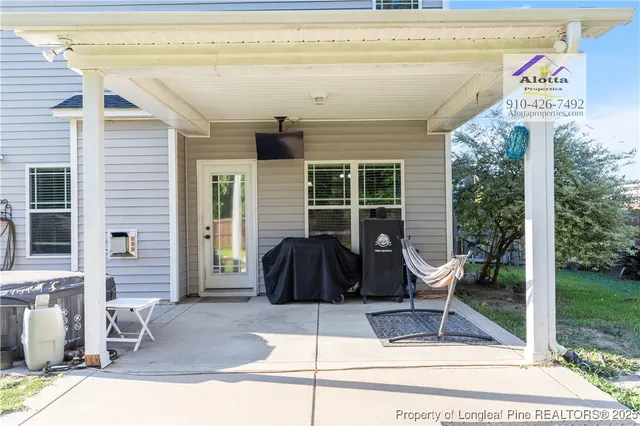 a building outdoor space with patio furniture