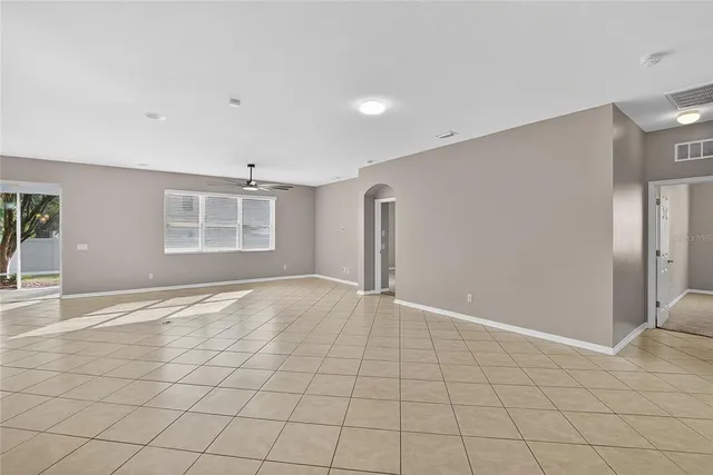 a kitchen with stainless steel appliances a sink stove and cabinets