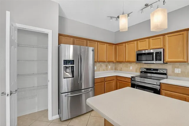 a white bath tub sitting next to a toilet