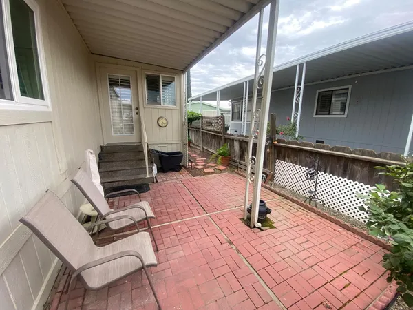 a front view of a house with patio