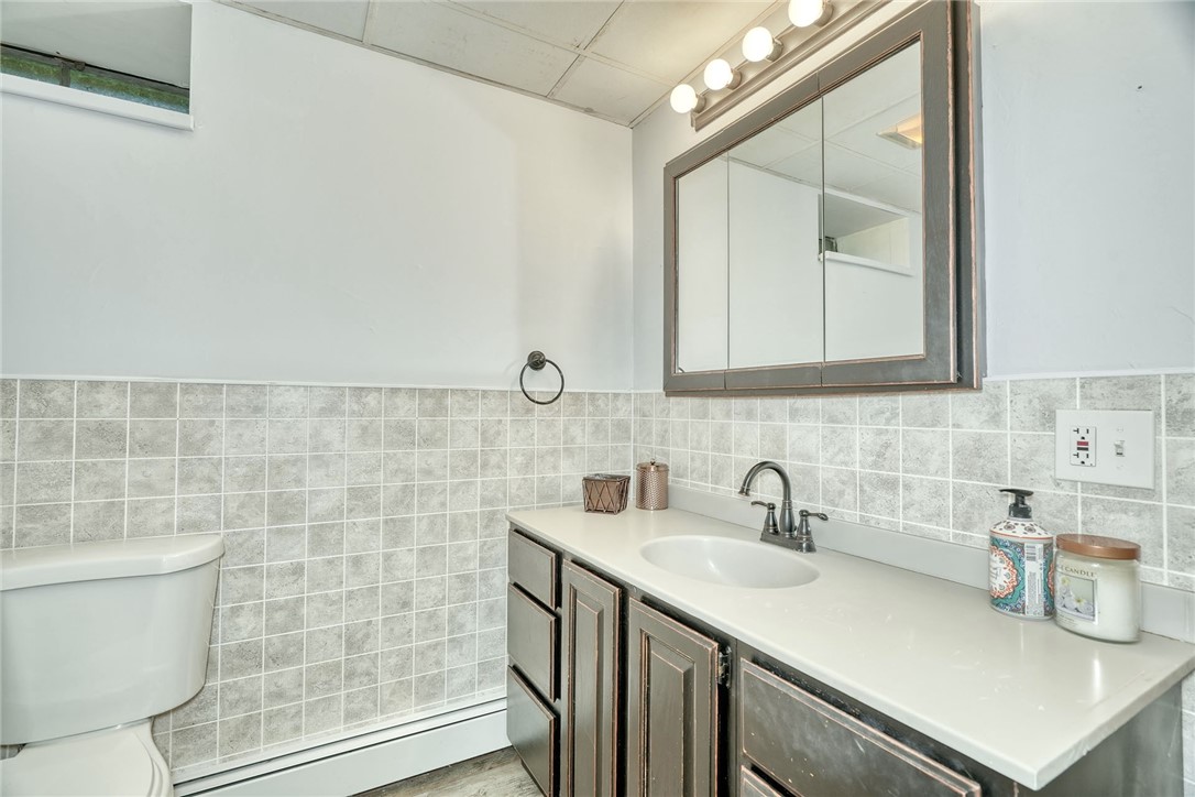 4005 County Line Road Walworth, NY 14502 - Photo 37 of 50 Finished lower level with private entrance and ful
