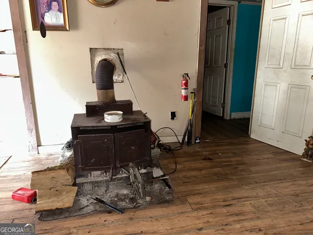 kids room with furniture and wooden floor