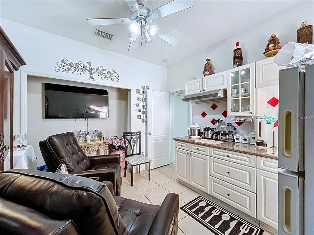 3324 West Abdella Street Tampa, FL 33607 - Photo 17 of 20 a bedroom with furniture and a couch