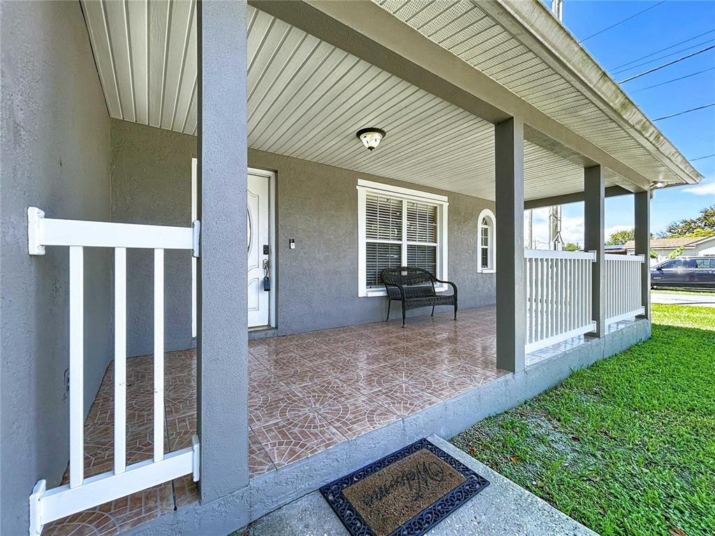 3324 West Abdella Street Tampa, FL 33607 - Photo 2 of 20 a view of a porch with a backyard