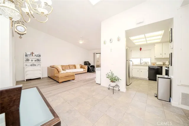 a living room with furniture and a table