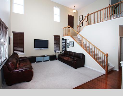 13523 Marigold Road Plainfield, IL 60544 - Photo 7 of 16 a living room with furniture and a flat screen tv