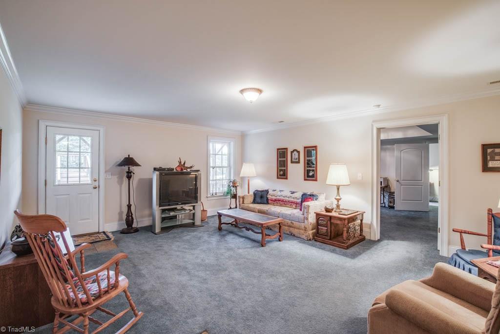 190 Baltimore Downs Road Advance, NC 27006 - Photo 20 of 30 Spacious den with walk-out to lower level patio