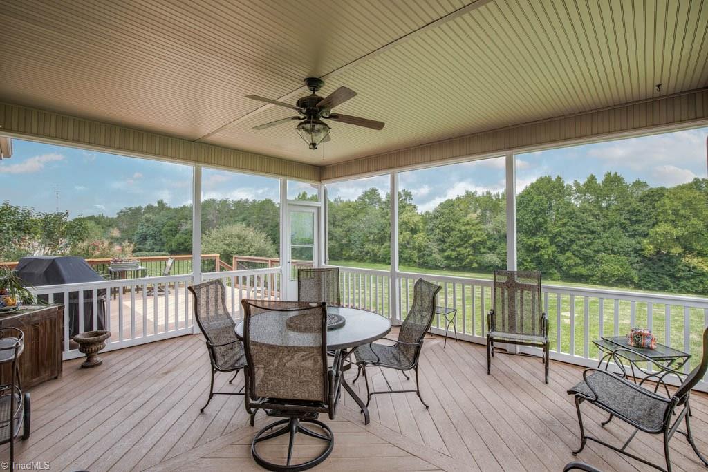 190 Baltimore Downs Road Advance, NC 27006 - Photo 25 of 30 Beautiful view of private backyard with screening row of Arbor Vitae