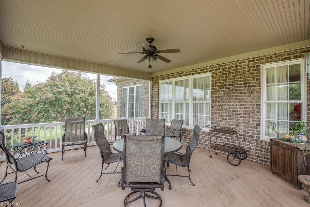 190 Baltimore Downs Road Advance, NC 27006 - Photo 26 of 30 Covered, screened porch with ceiling fan