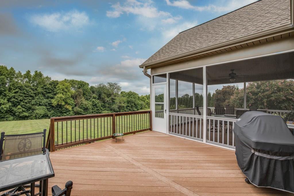 190 Baltimore Downs Road Advance, NC 27006 - Photo 27 of 30 Composite Deck attached to screened porch with access to breakfast/kitchen and stairs to lower level patio