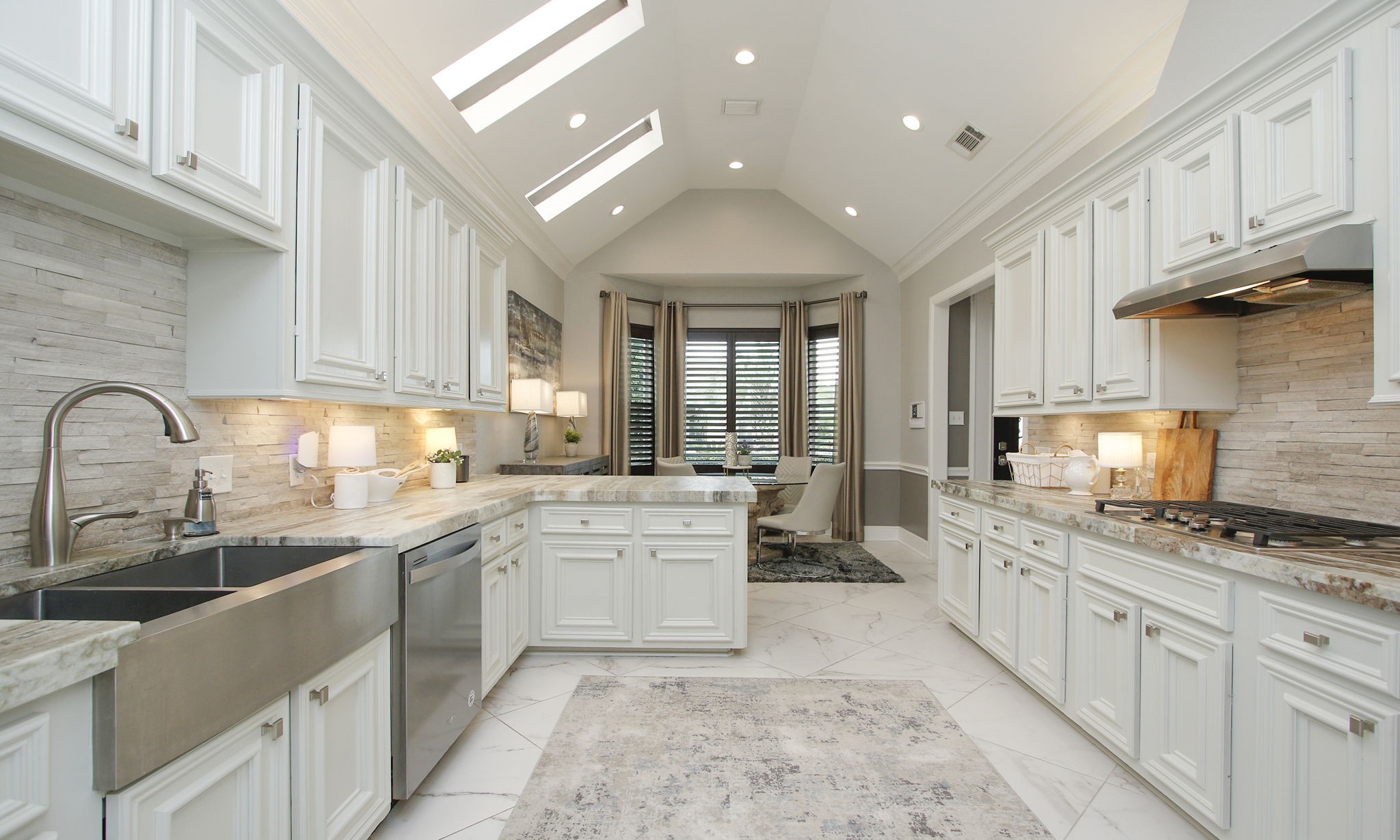 16610 Manningtree Lane Spring, TX 77379 - Photo 23 of 50 The remodeled kitchen has tall ceilings with three skylights.