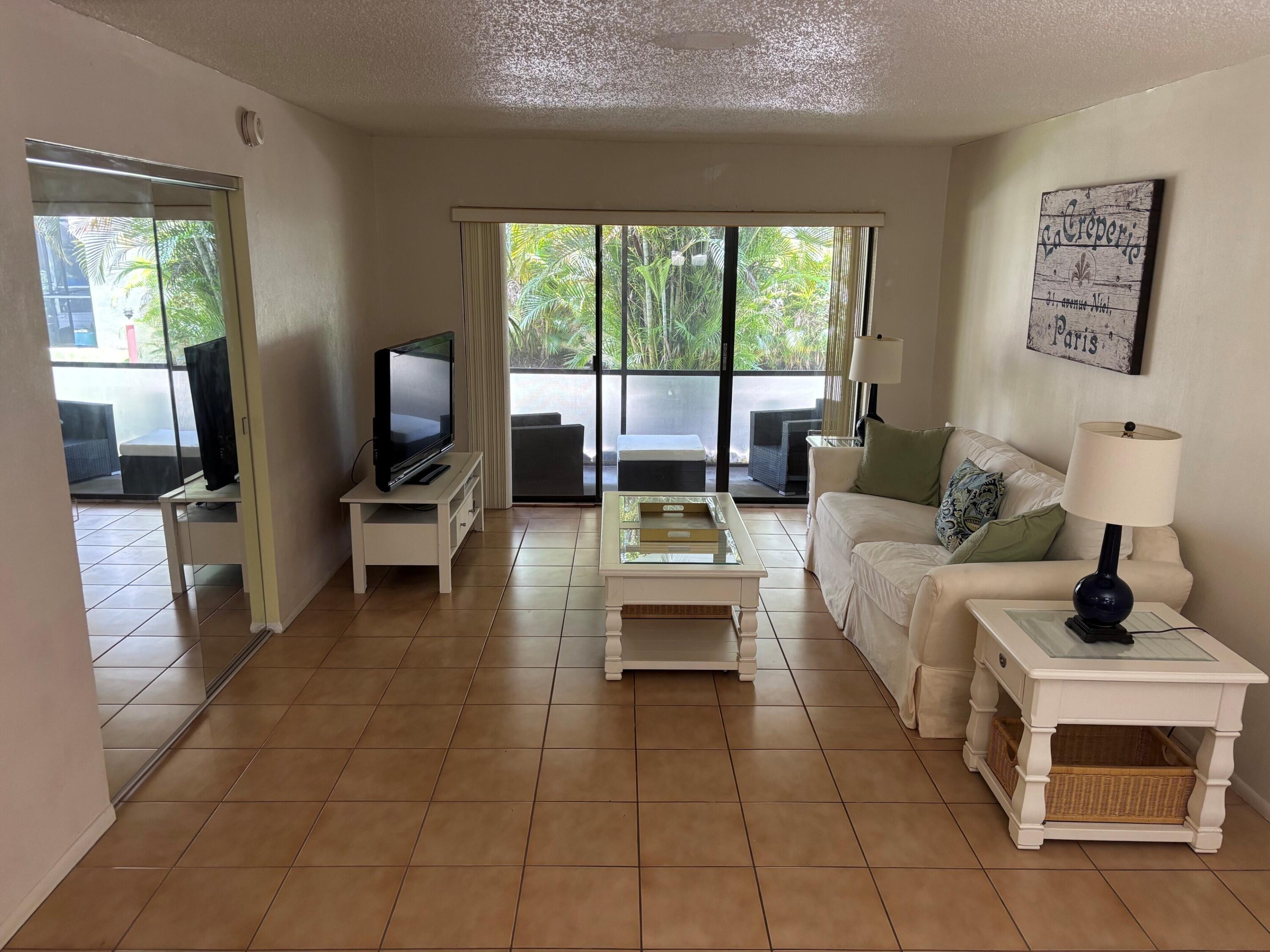 301 North Pine Island Road, Unit 105 Plantation, FL 33324 - Photo 2 of 9 Living room