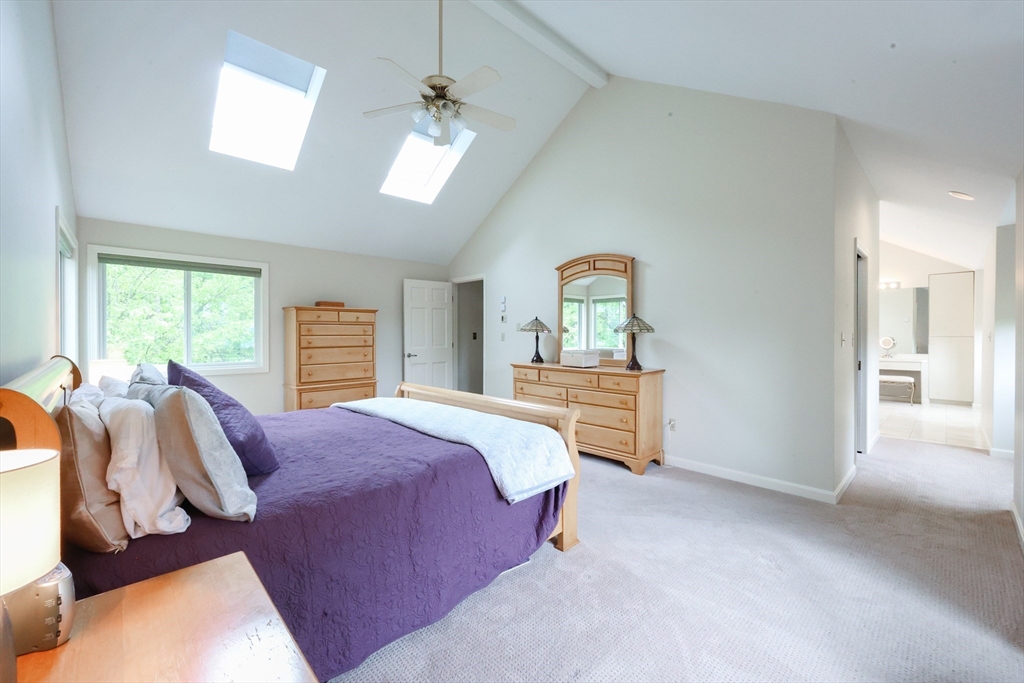 10 Grover Road Ashland, MA 01721 - Photo 13 of 41 a spacious bedroom with a bed and a dresser
