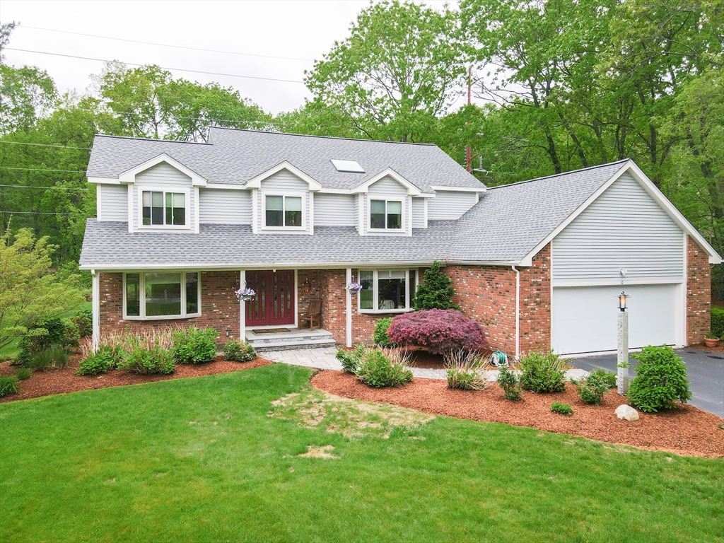 10 Grover Road Ashland, MA 01721 - Photo 2 of 41 a front view of a house with a yard and porch