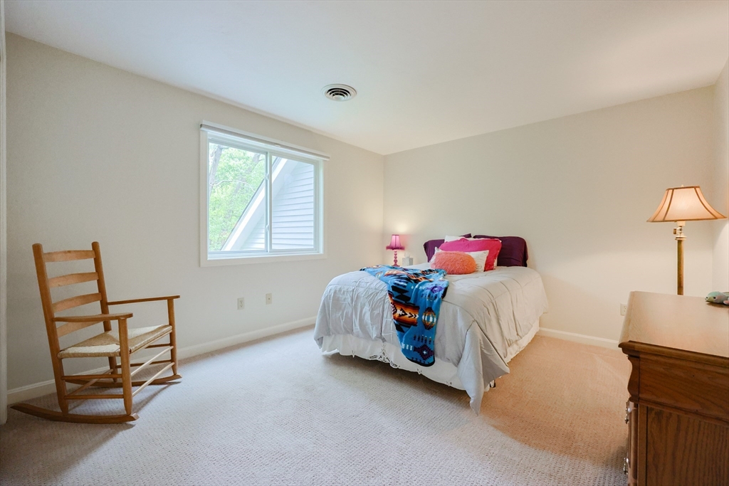 10 Grover Road Ashland, MA 01721 - Photo 21 of 41 a bedroom with a bed and a window