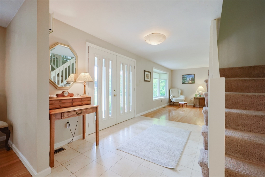 10 Grover Road Ashland, MA 01721 - Photo 22 of 41 a living room with furniture and a table