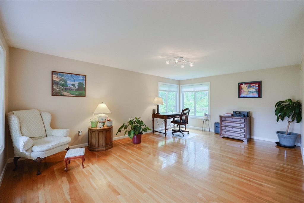 10 Grover Road Ashland, MA 01721 - Photo 23 of 41 a living room with furniture and wooden floor