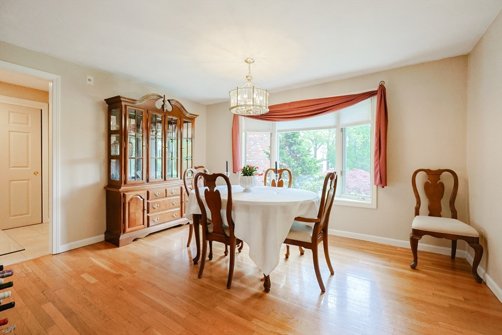 10 Grover Road Ashland, MA 01721 - Photo 26 of 41 a view of a dining room with furniture window and wooden floor