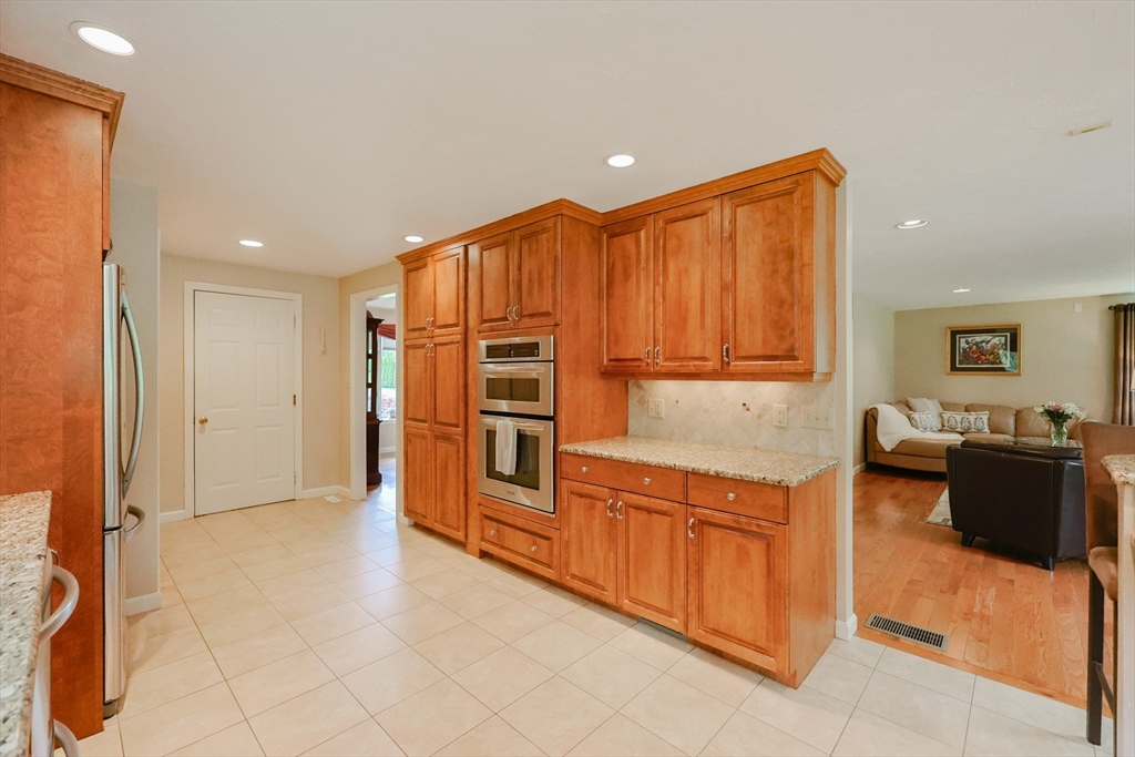 10 Grover Road Ashland, MA 01721 - Photo 30 of 41 a view of a kitchen with furniture and an entryway