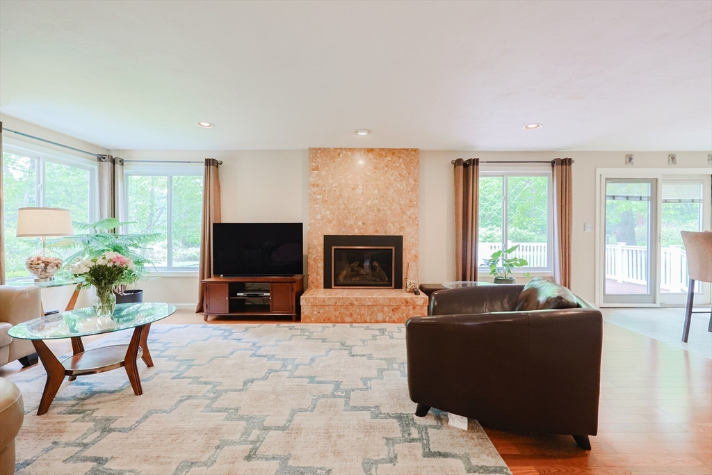 10 Grover Road Ashland, MA 01721 - Photo 34 of 41 a living room with furniture and a flat screen tv