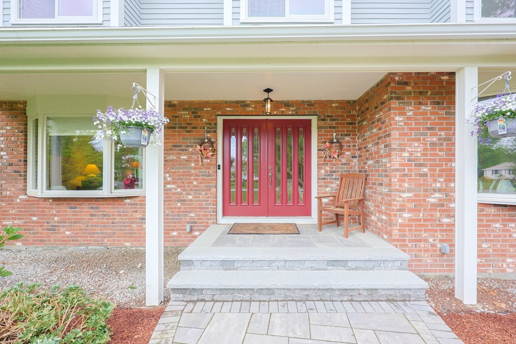10 Grover Road Ashland, MA 01721 - Photo 4 of 41 a view of entryway with a flower garden