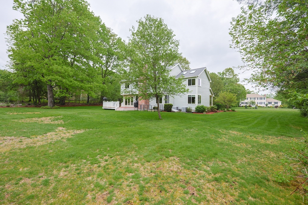 10 Grover Road Ashland, MA 01721 - Photo 41 of 41 a front view of a house with garden