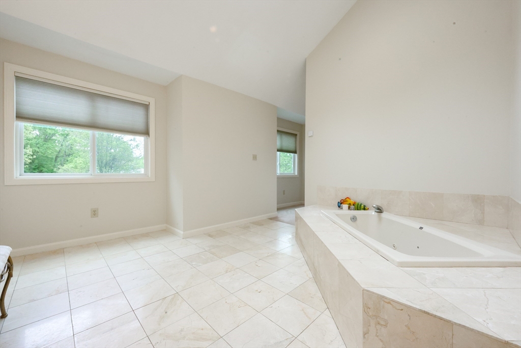 10 Grover Road Ashland, MA 01721 - Photo 10 of 41 a bath room with a sink and a bath tub
