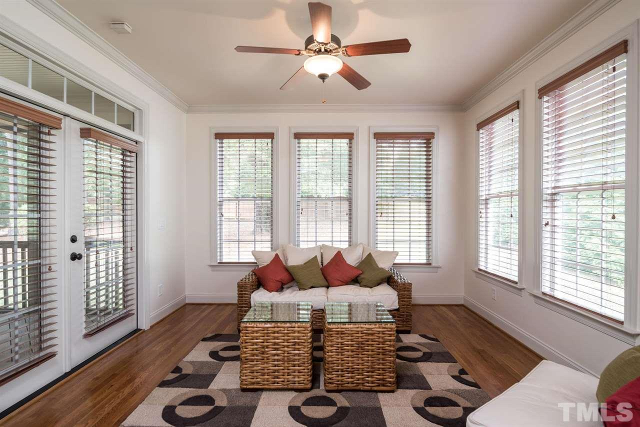 11511 Azari Court Raleigh, NC 27614 - Photo 11 of 25 a living room with furniture and wooden floor